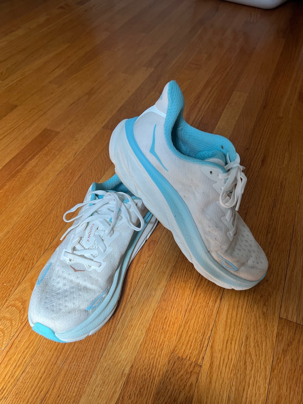 White and blue Hoka Women's Running Shoes